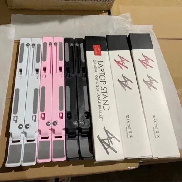 8f0403b8b5e9876b7948fc5f0aed74ea.webp Random Foldable Laptop Stand